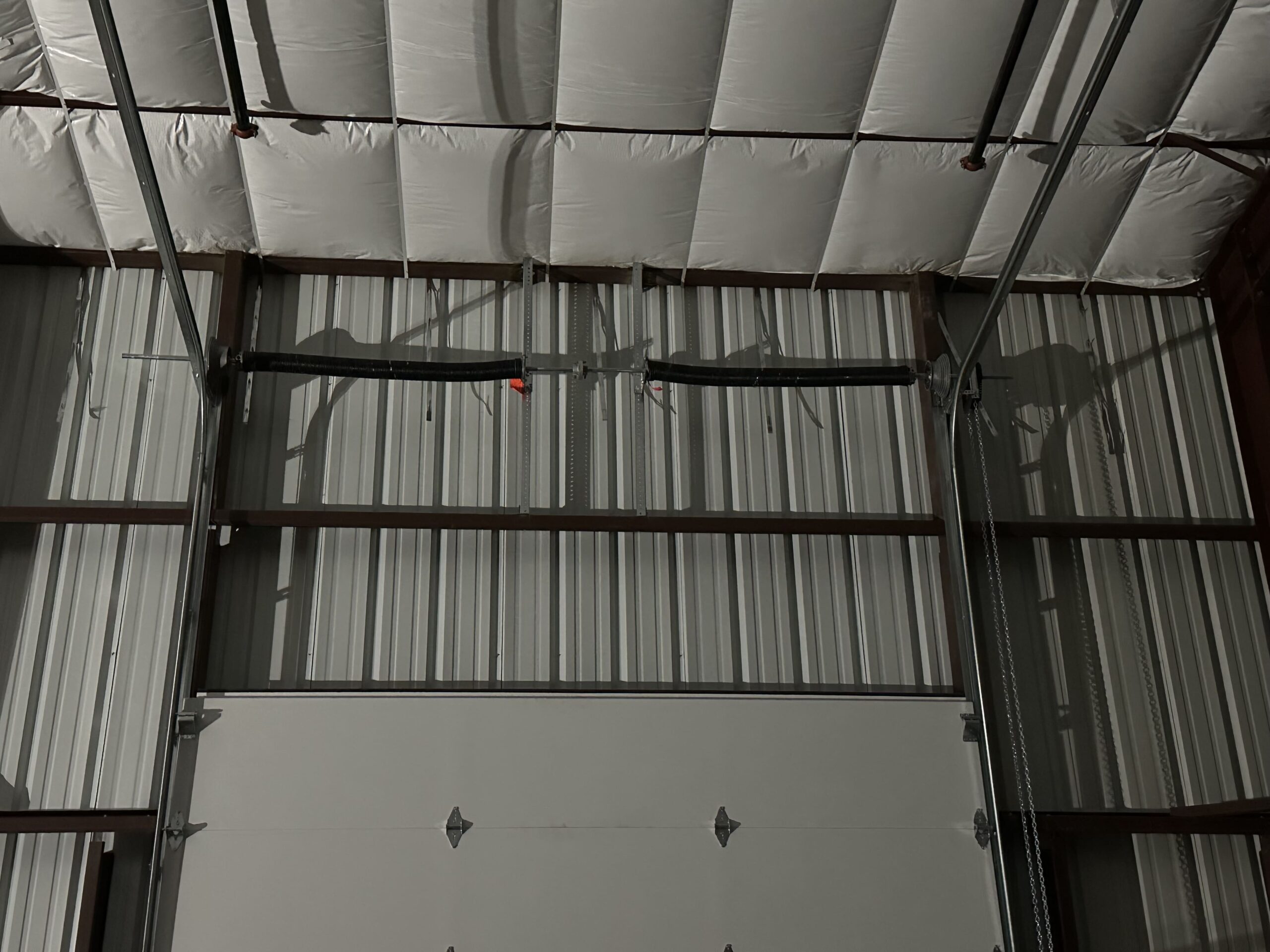 commercial-overhead-door-springs new double spring garage door installed