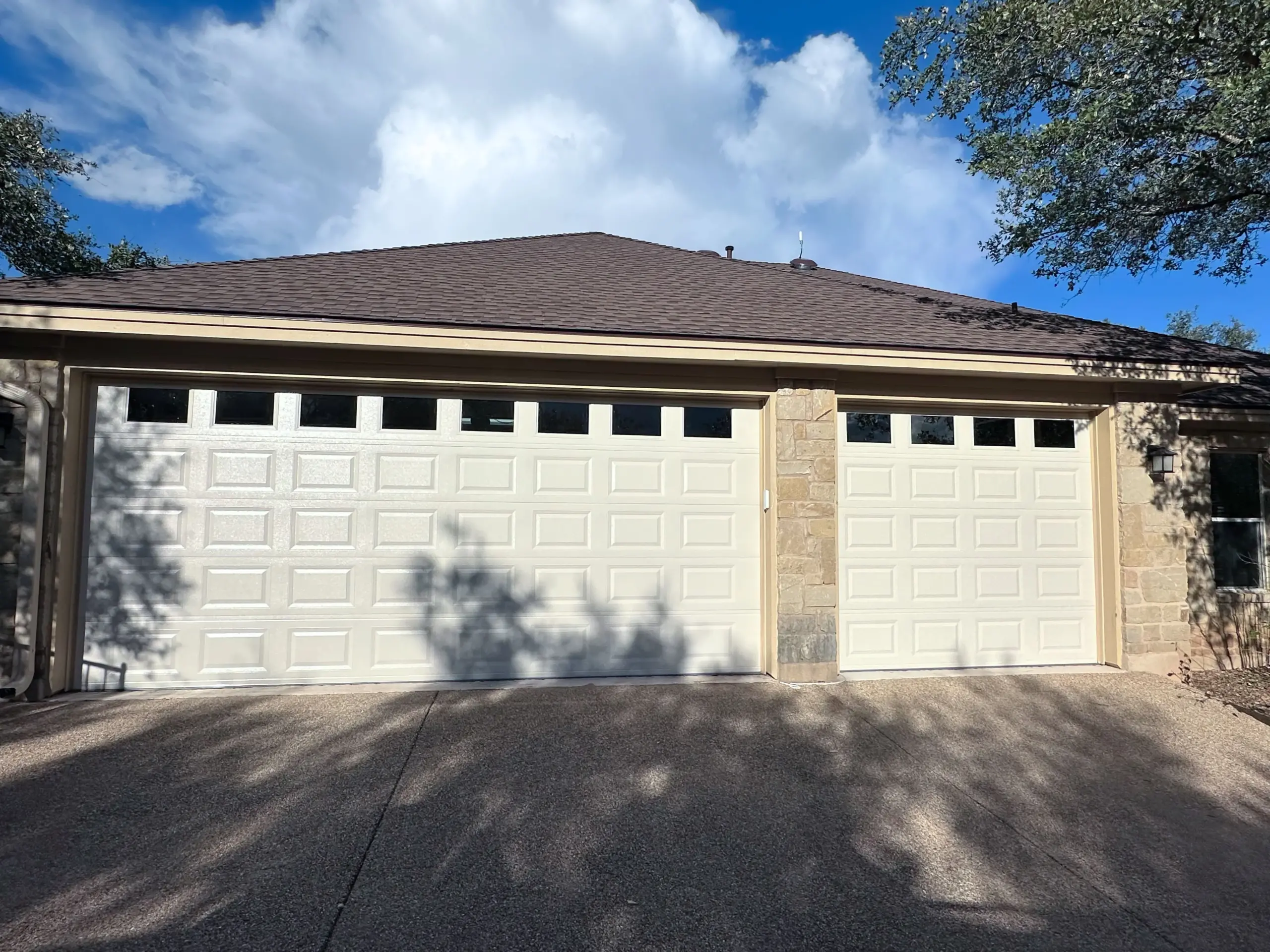 garage-door-replacement-leander1 two newly installed garage doors